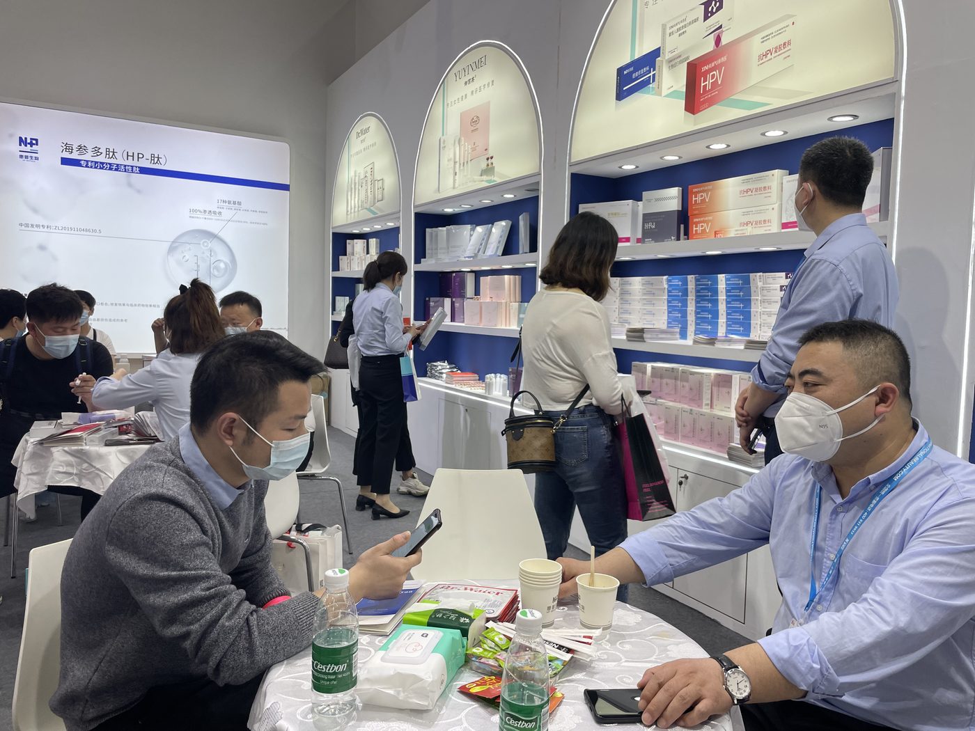 Client meeting at international trade exhibition